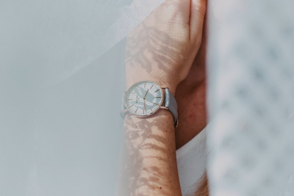 Wristwatch in dappled light